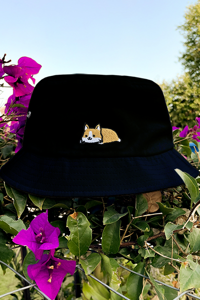 Relaxing Corgi Eyelet Bucket Hat