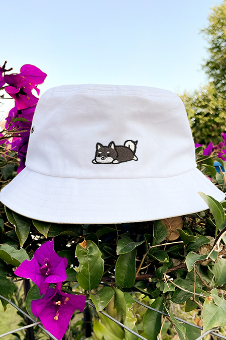 Relaxing Black Shiba Inu Eyelet Bucket Hat