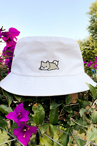 Relaxing White Shiba Inu Eyelet Bucket Hat